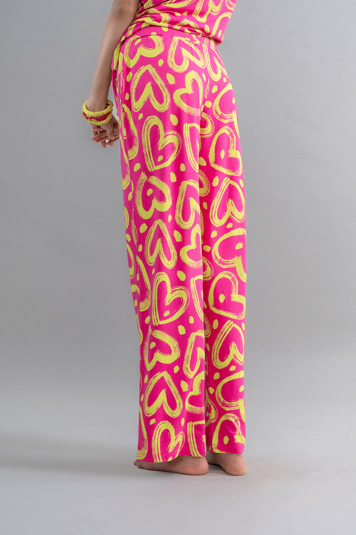 Limited Edition Lovestruck Pink Heart Flared Pajamas with vibrant heart pattern.