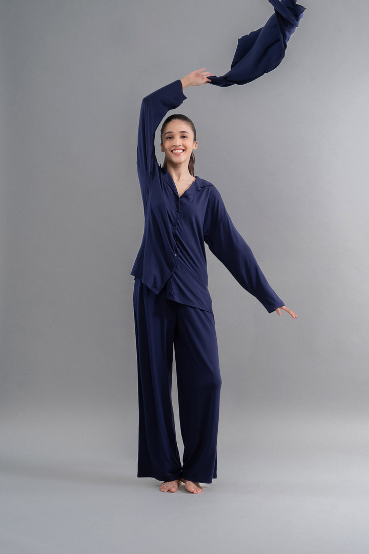 Flared modal pajama set with long lounge top, model posing elegantly.