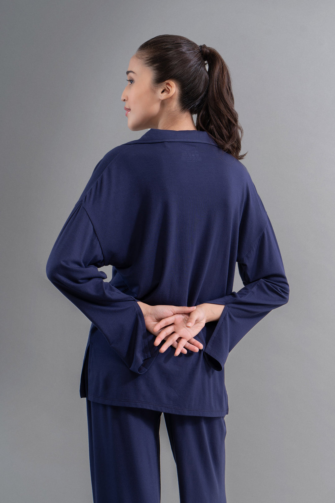 Deep navy Supima button down shirt with stylish slit detail.