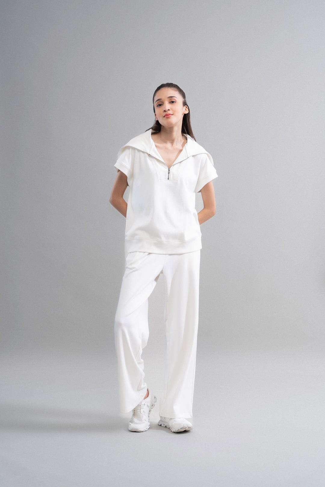 Model wearing Snugknit® Co Ord Set in elegant all-white outfit.