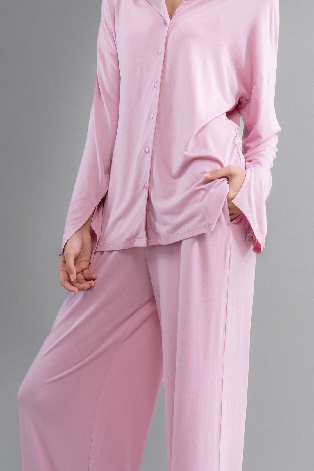 Deep pink modal button-down shirt with stylish slit design.