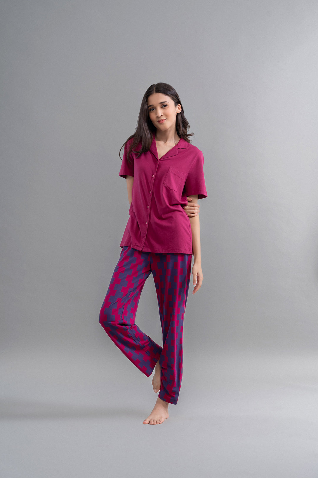 Ruby Supima half sleeve button down shirt with stylish patterned pants.