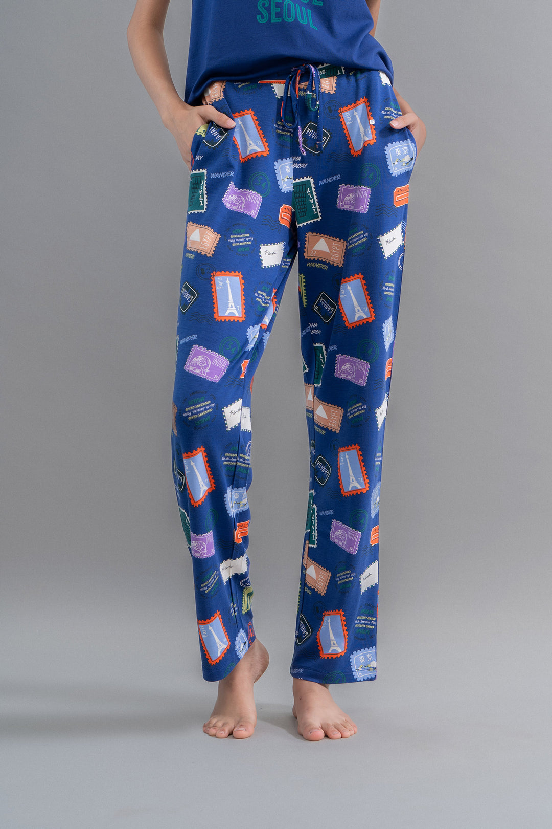 Wanderlust Blue Modal Straight Pajamas with travel-themed print and pockets.