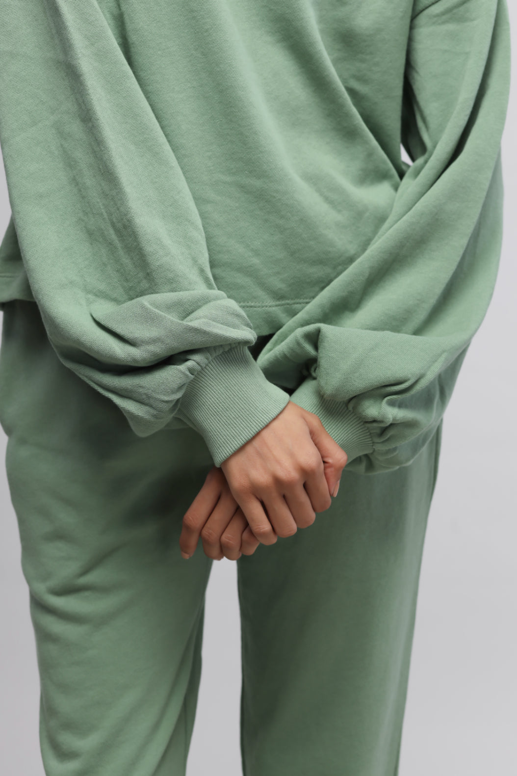 Mint green puffed sleeves terry sweatshirt, perfect for casual wear.