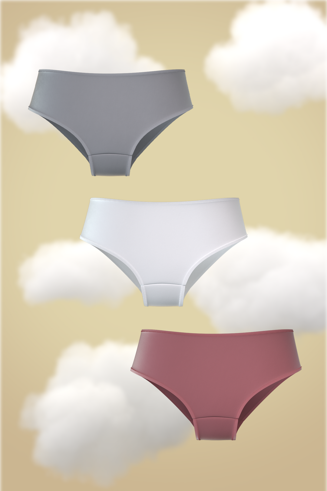 Set of three Nessie hipster panties in grey, white, and rose.