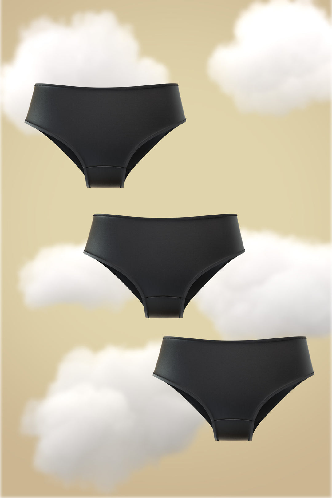 Set of three black Supima Modal hipster panties on a soft background.