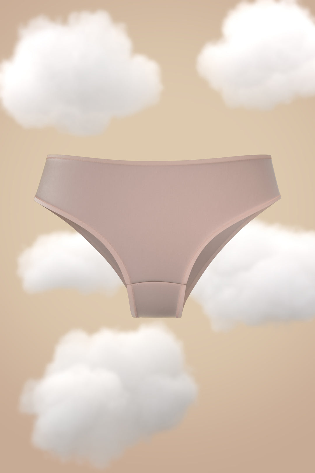 Supima Modal Hipster Nessies in soft pink against a cloud background.