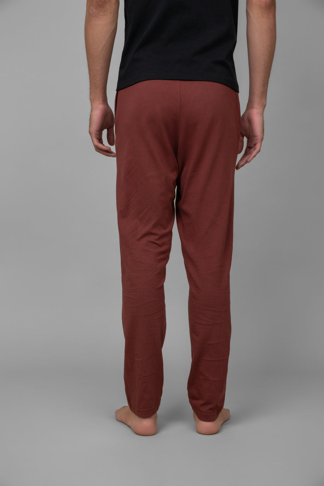 Men's shadow red lounge pants, back view, comfortable and stylish.