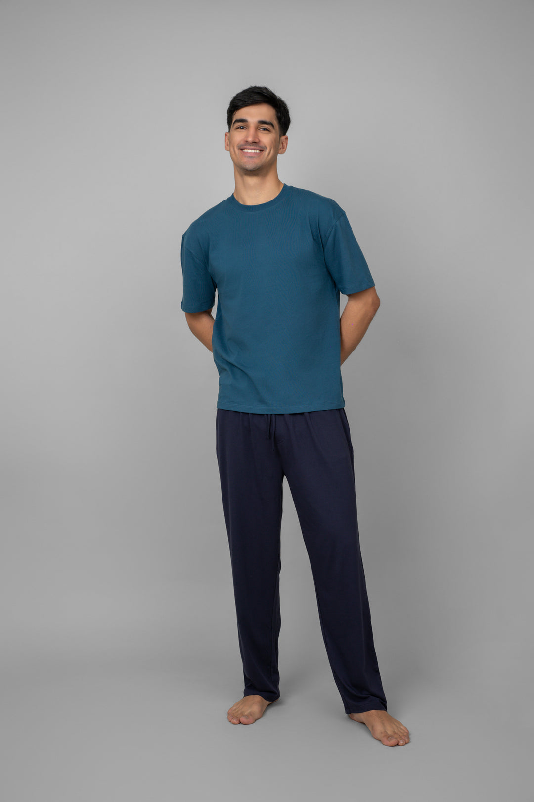 Dark navy men's pajama set featuring comfortable short-sleeve top and pants.