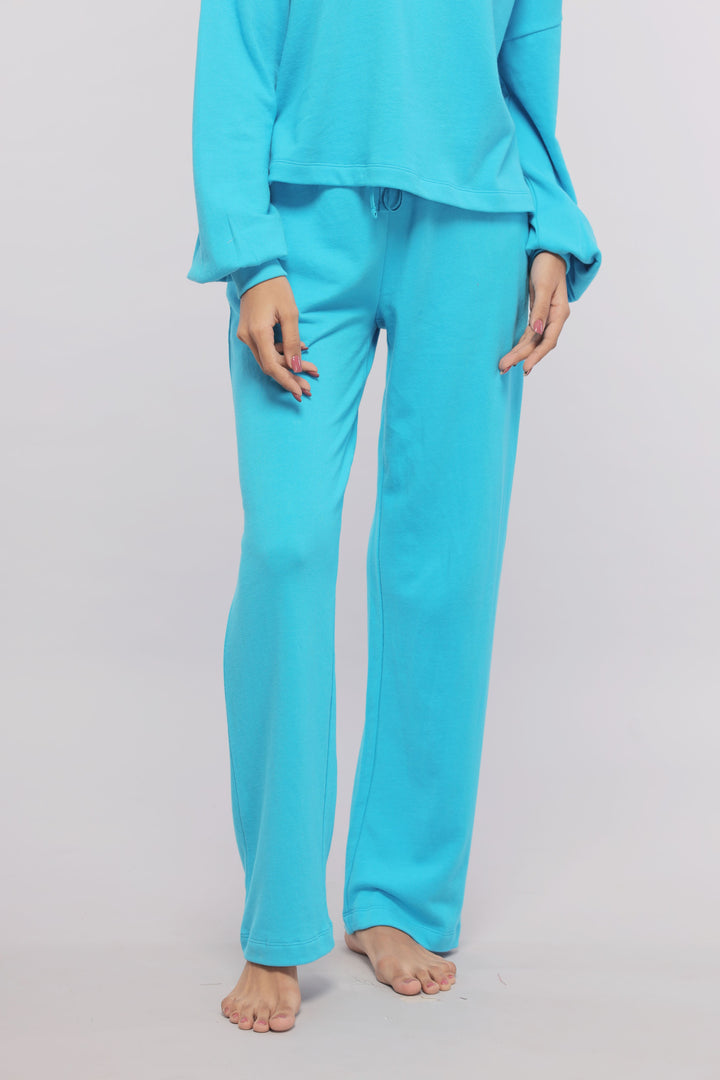 Aqua Terry Travel Set: comfortable blue loungewear for ultimate travel relaxation.