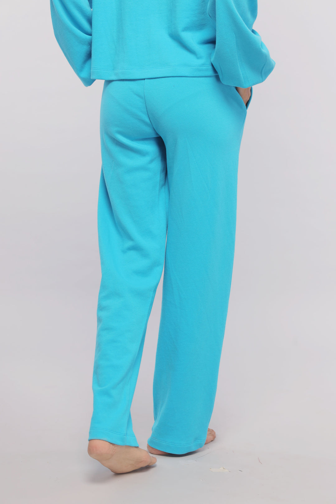 Aqua Terry Travel Set featuring comfortable blue lounge pants and top.