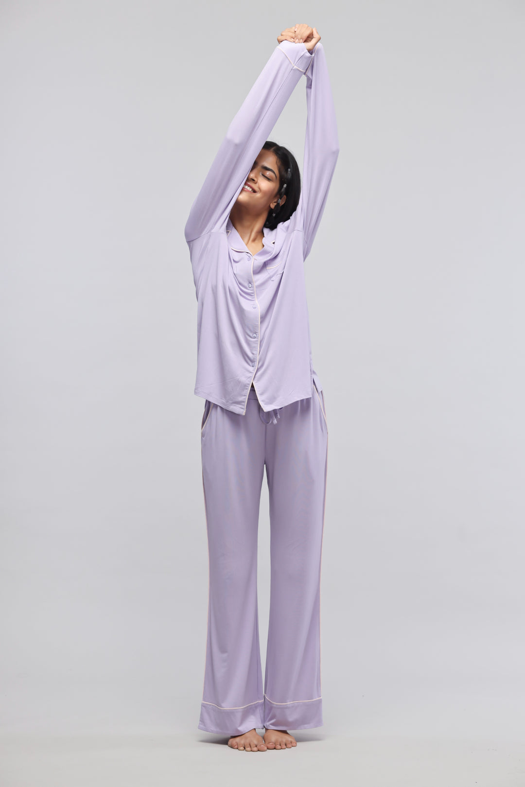 Lavender piping pajama set with full sleeve top, stylish and comfortable.