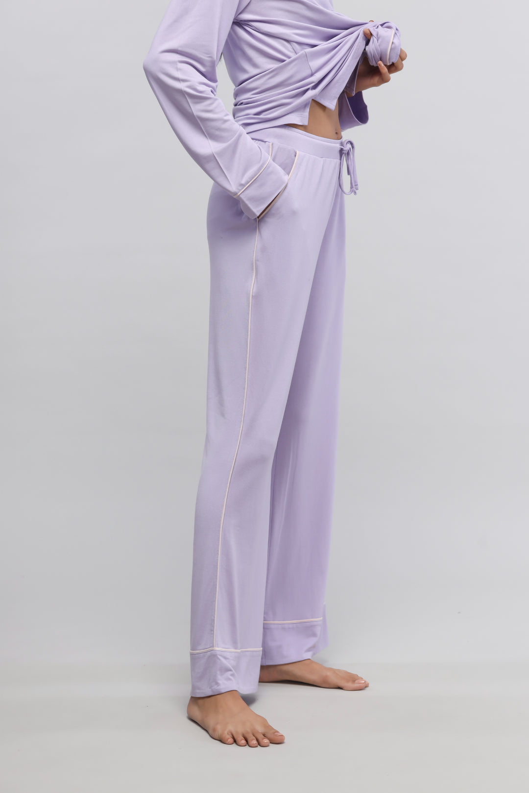 Lavender piping pajama set with full sleeve top, stylish and comfortable.