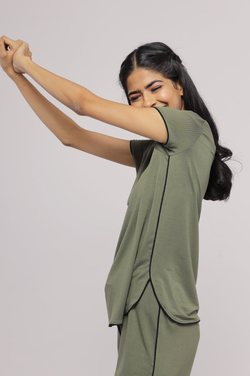 Olive green multipurpose lounge pant styled with a relaxed fit.