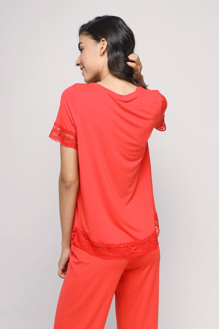 Delicate Lace Angel Pajamas Set in vibrant coral with lace details.