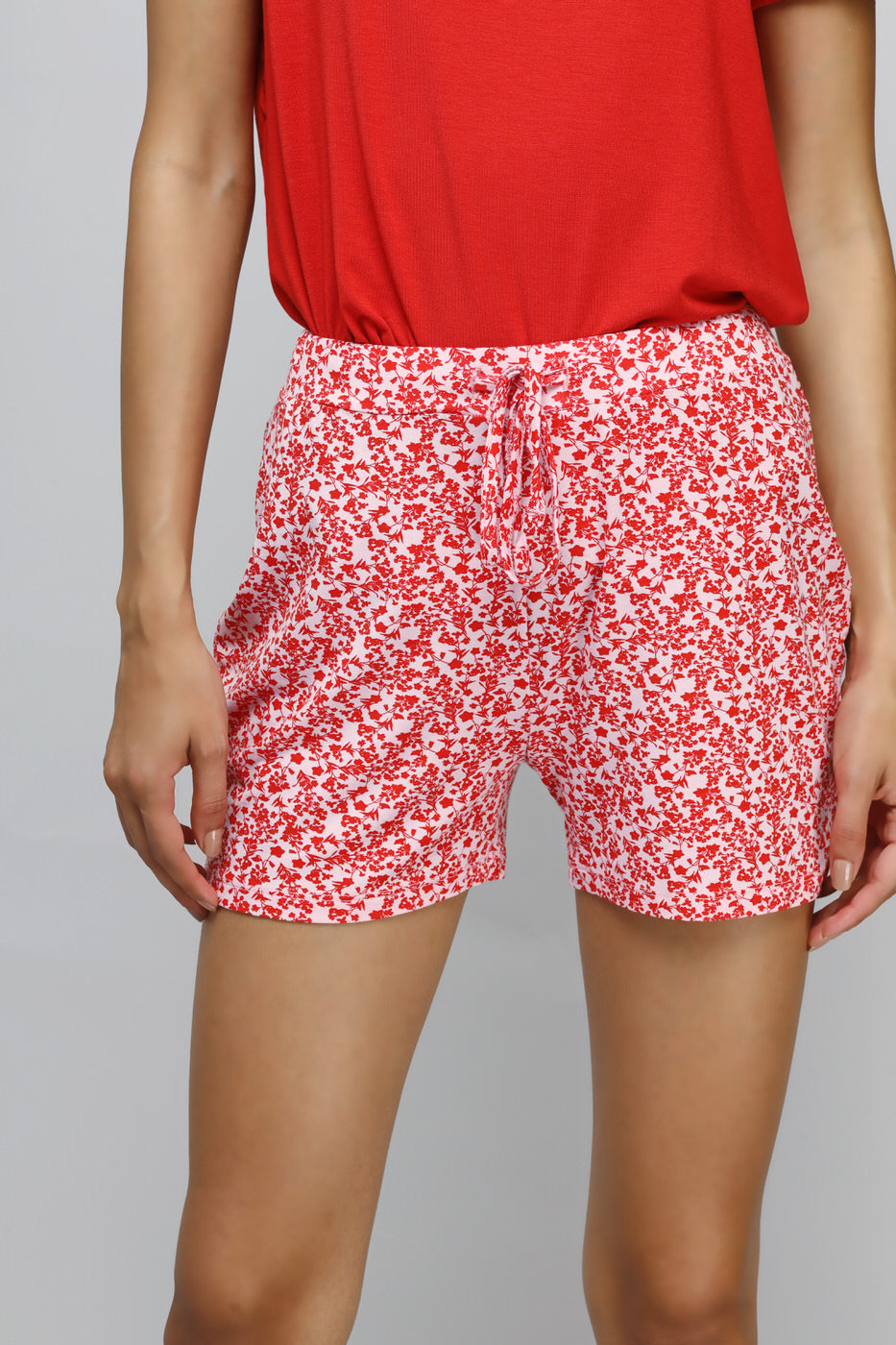 Floral Dream Short with red floral pattern and comfortable fit.