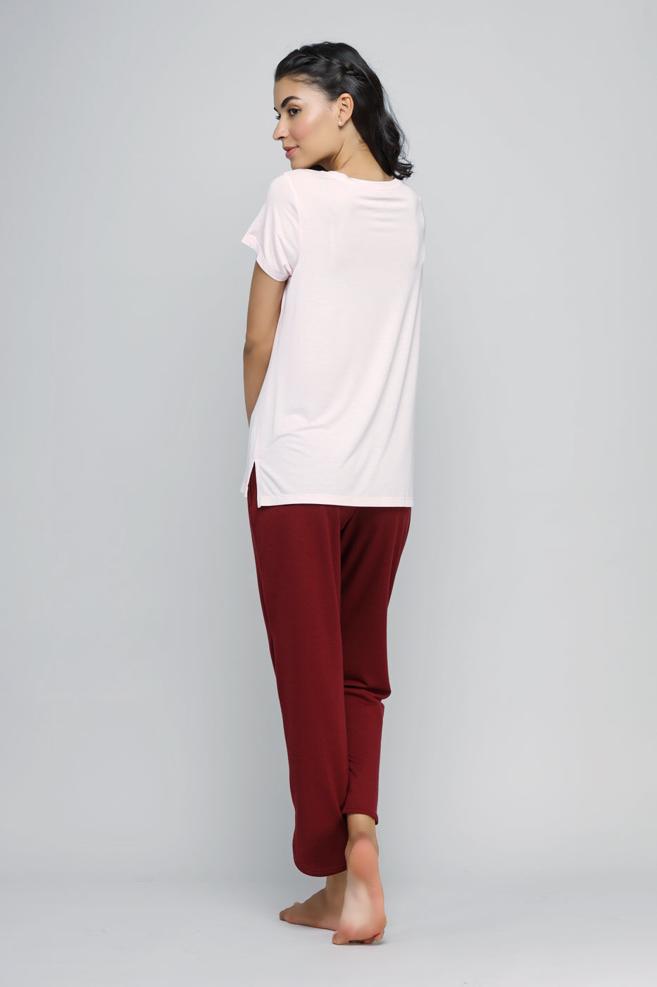 Stylish Energise Jogger Set featuring a pink top and maroon pants.