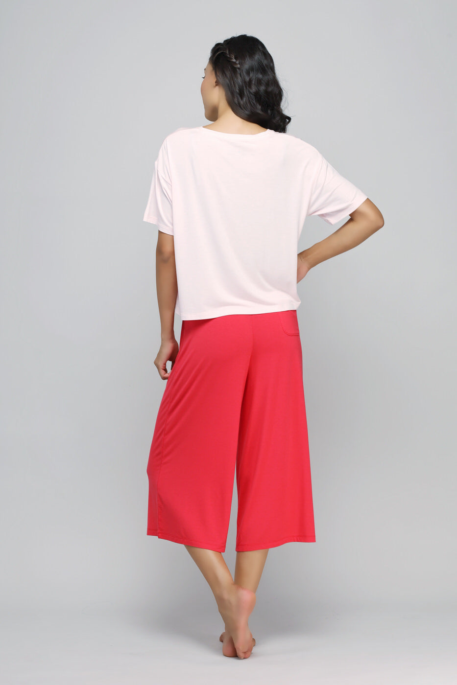 Back view of model wearing Love Red Culottes Set, stylish and comfortable.