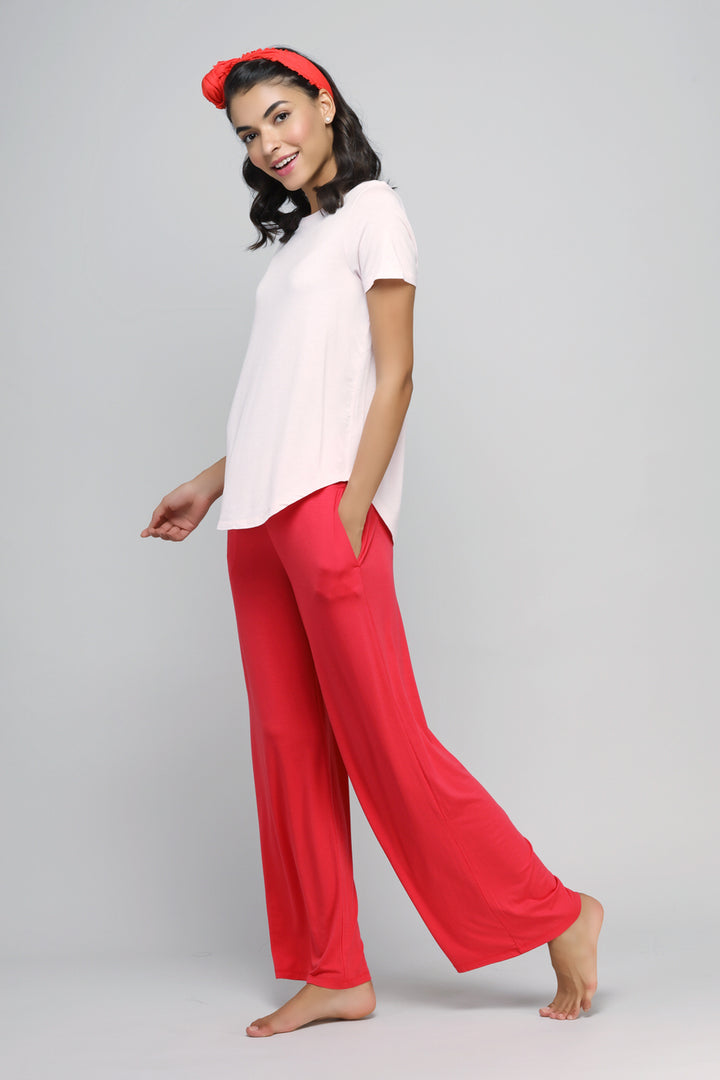 Love Red Flared Lounge Pant displayed on model in stylish outfit.