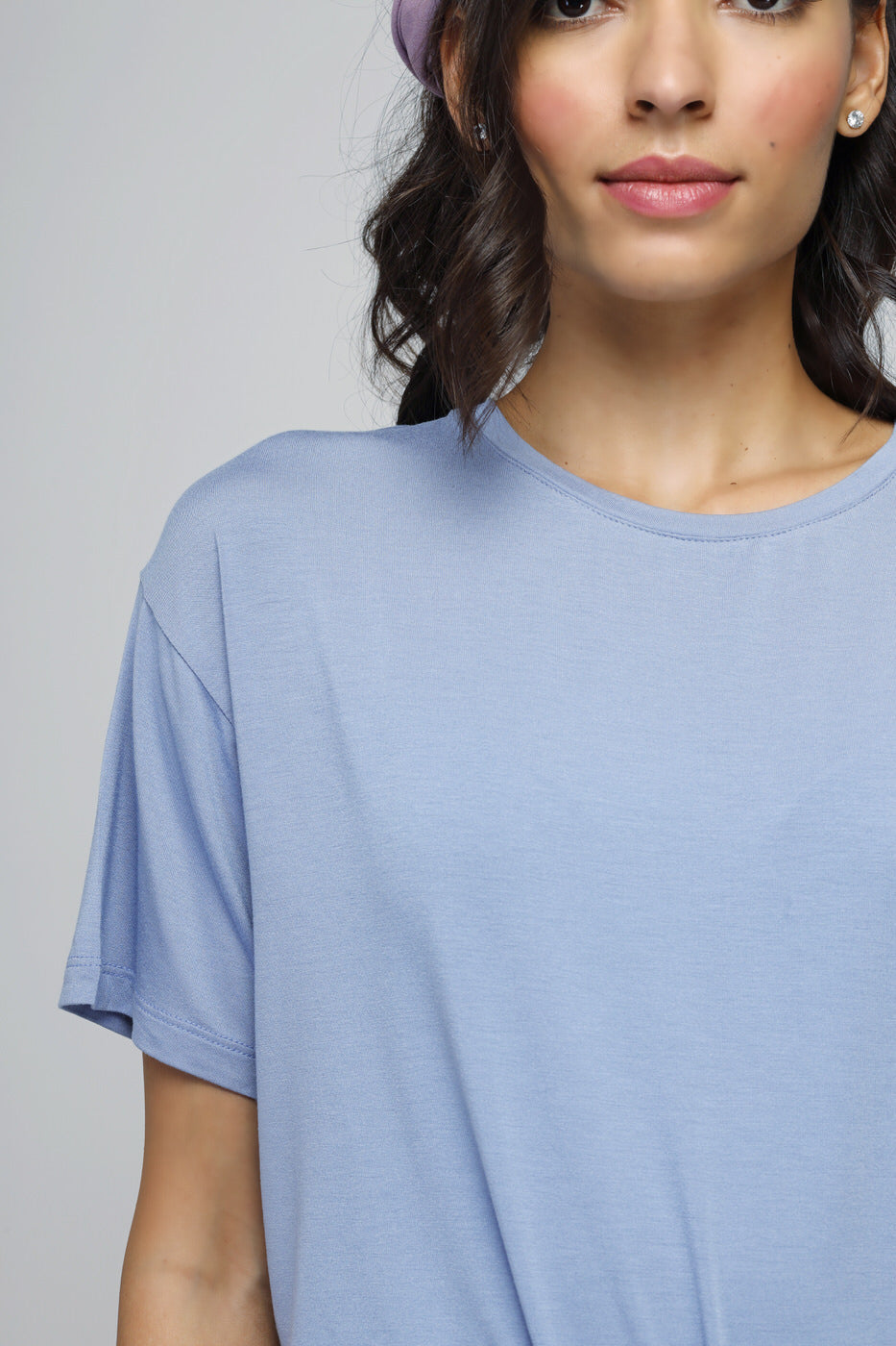 Calming blue crop top, soft fabric, casual summer style.