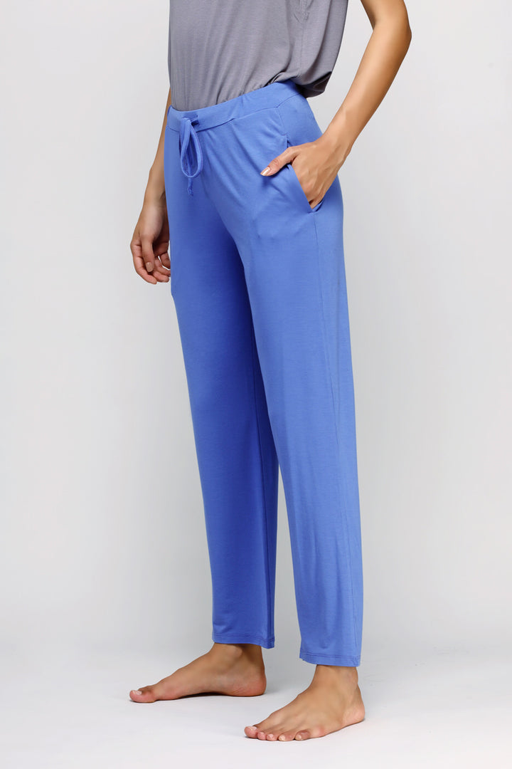 Relaxed blue lounge set featuring straight-leg pants and lightweight fabric.