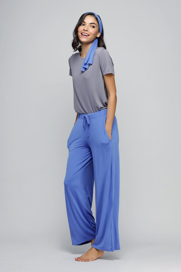 Relaxed blue flared lounge set model wearing comfortable outfit.