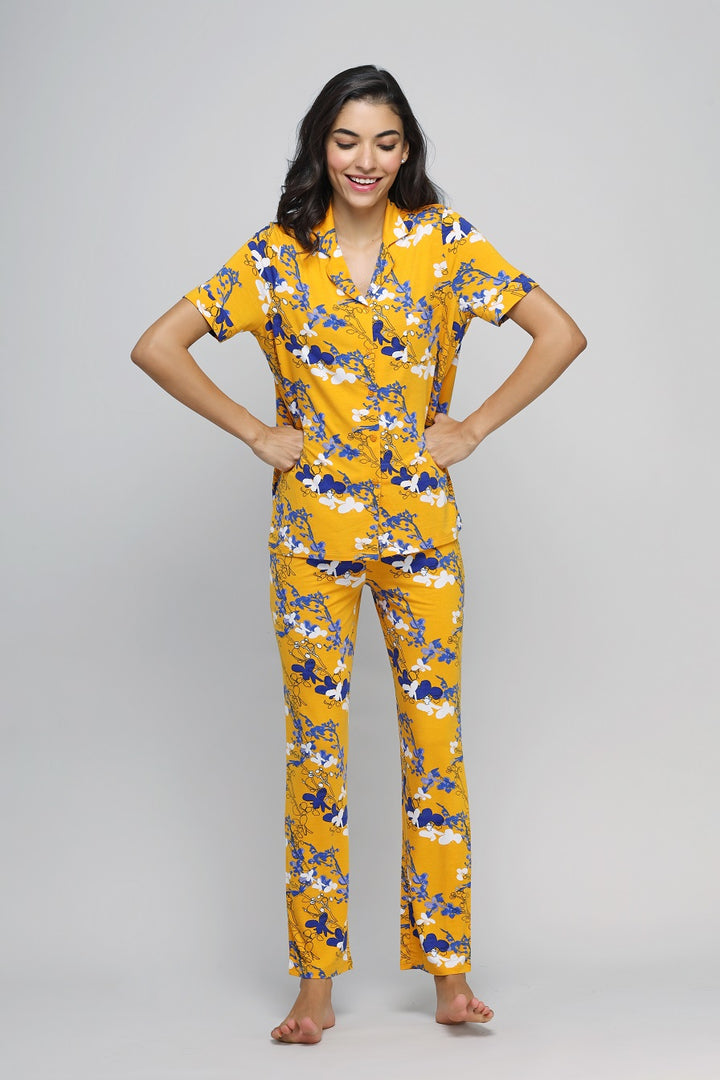 Floral Love Button Down Pajama Set in bright yellow, featuring vibrant floral patterns.