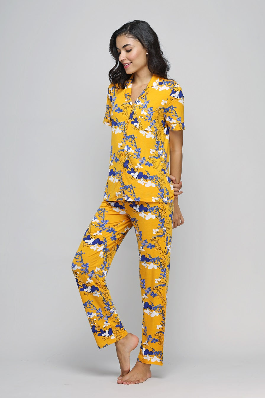 Floral Love Button Down Pajama Set in vibrant yellow and blue flowers.