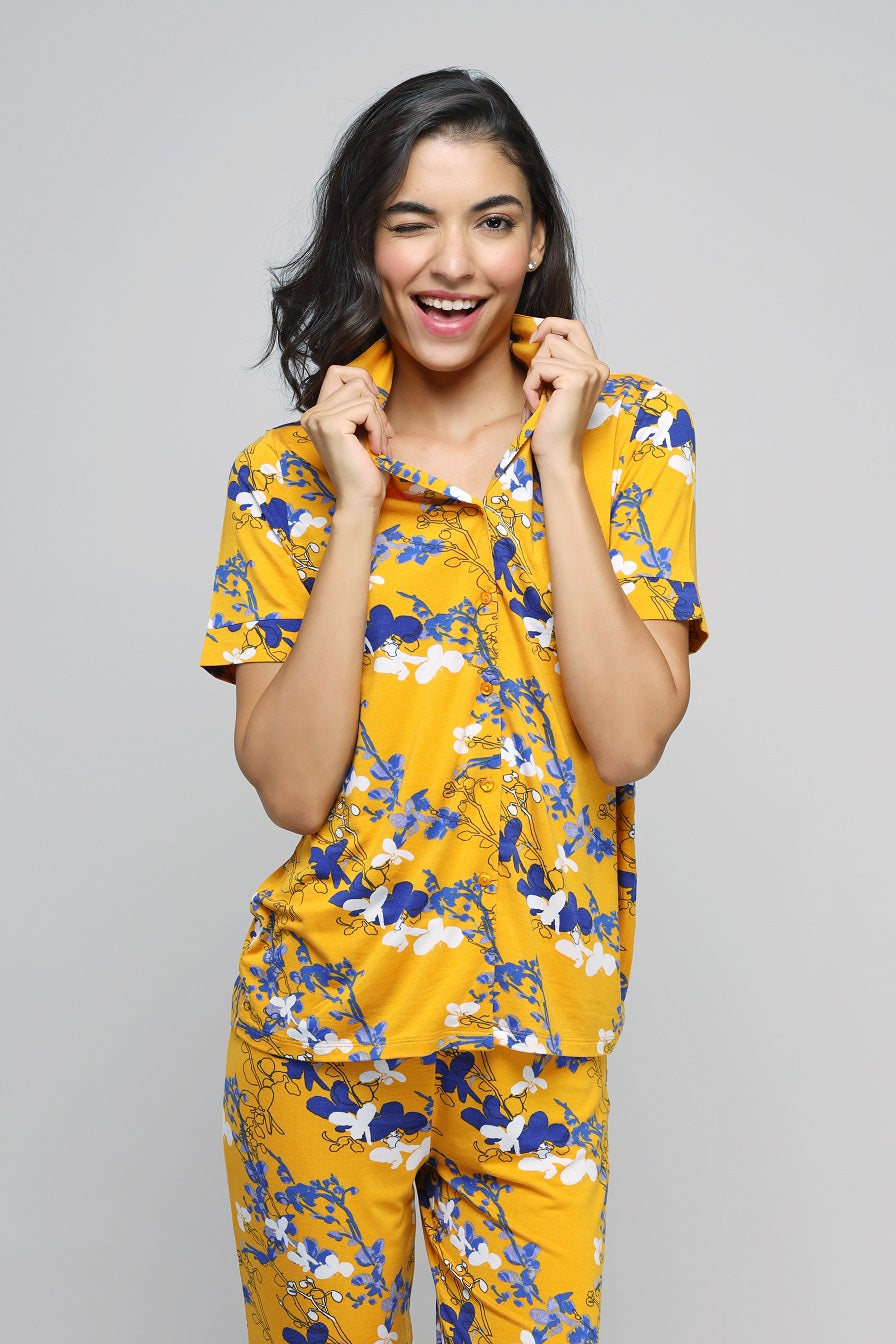 Floral Love Button Down Pajama Set in vibrant yellow and floral patterns.