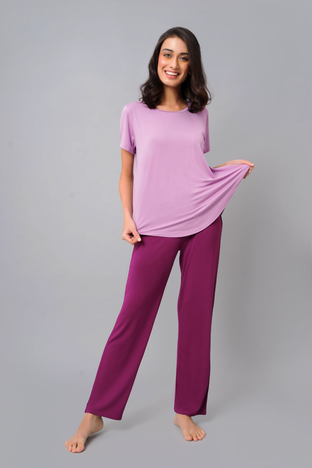 Wineberry Straight Lounge Set featuring a model in purple outfit.