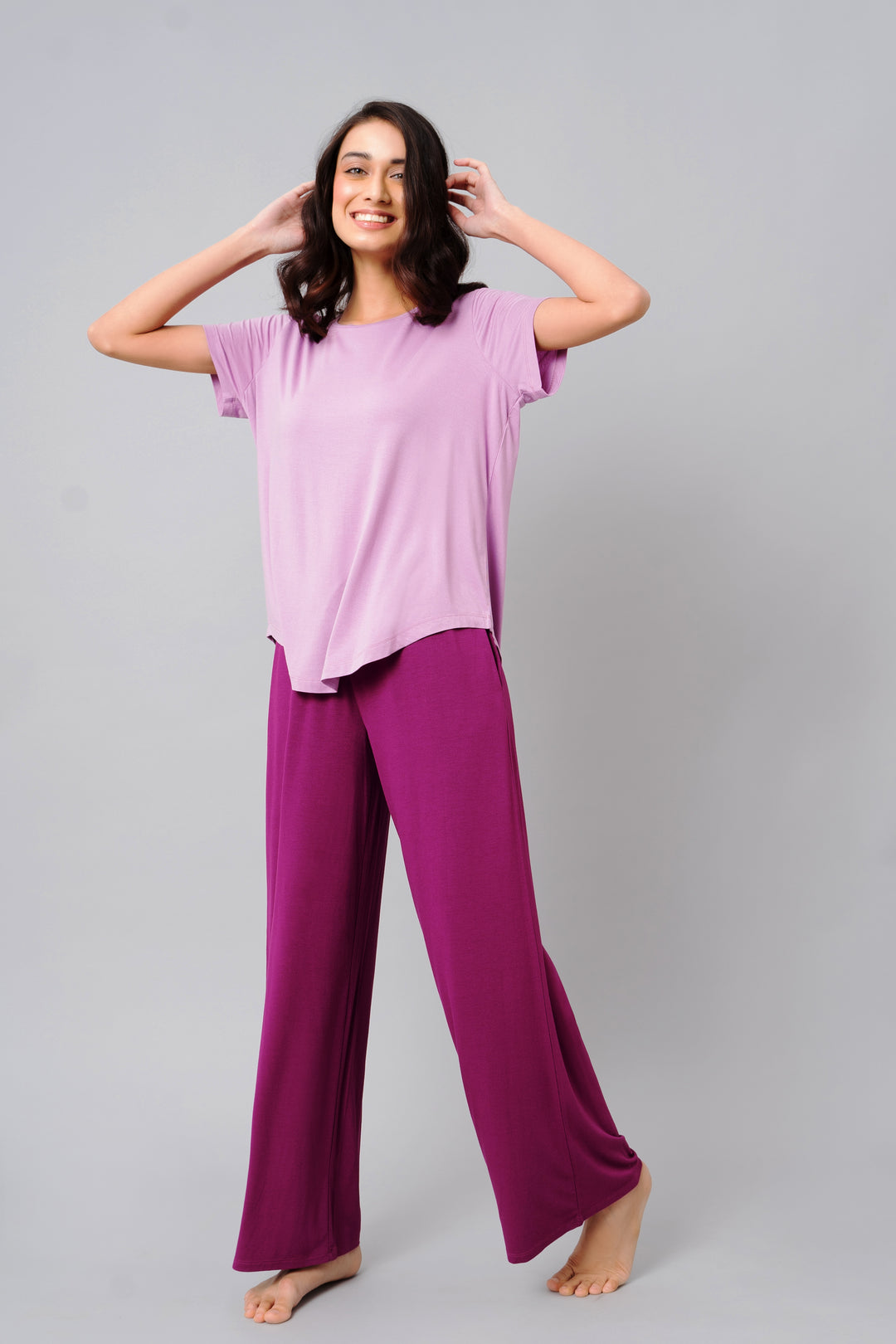 Wineberry Flared Lounge Set featuring a relaxed t-shirt and wide-leg pants.