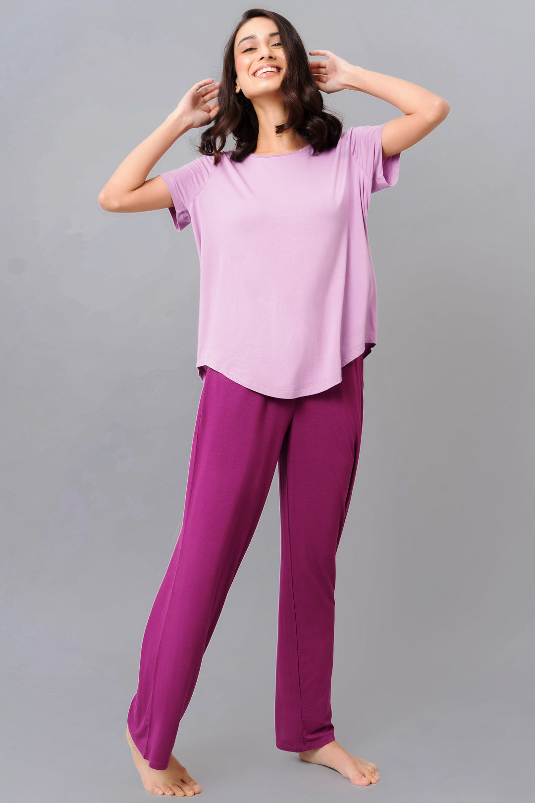 Wineberry flared lounge set with stylish purple top and pants.