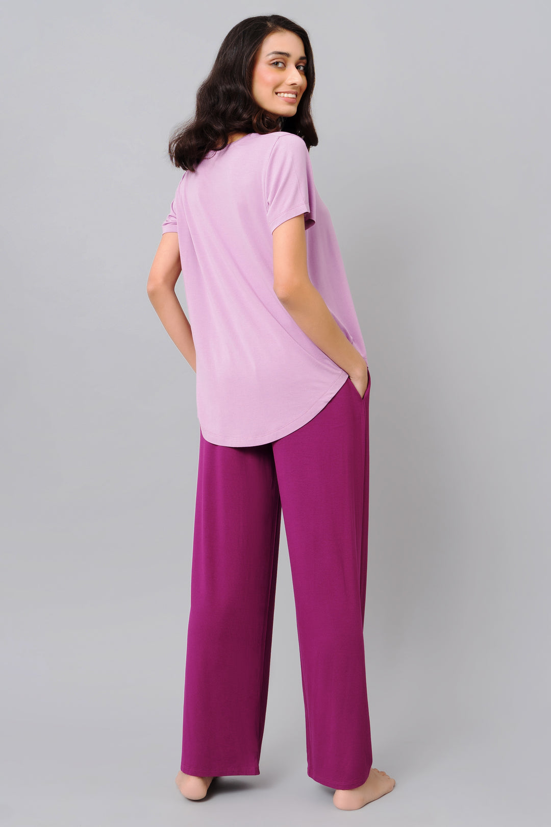 Wineberry Flared Lounge Set featuring stylish purple top and pants.