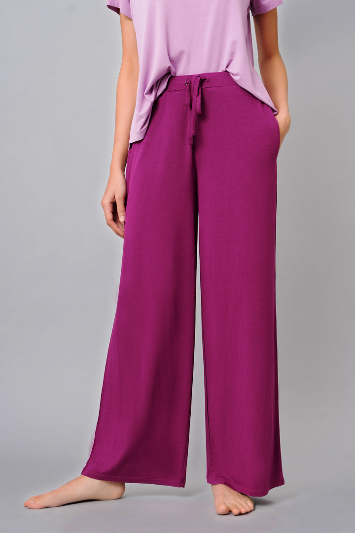 Wineberry Flared Lounge Set featuring loose-fitting pants and a stylish top.