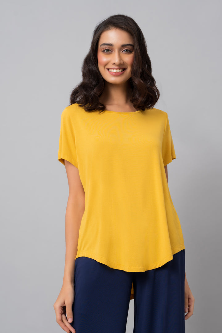 Buttercup yellow top for women, casual wear style with relaxed fit.