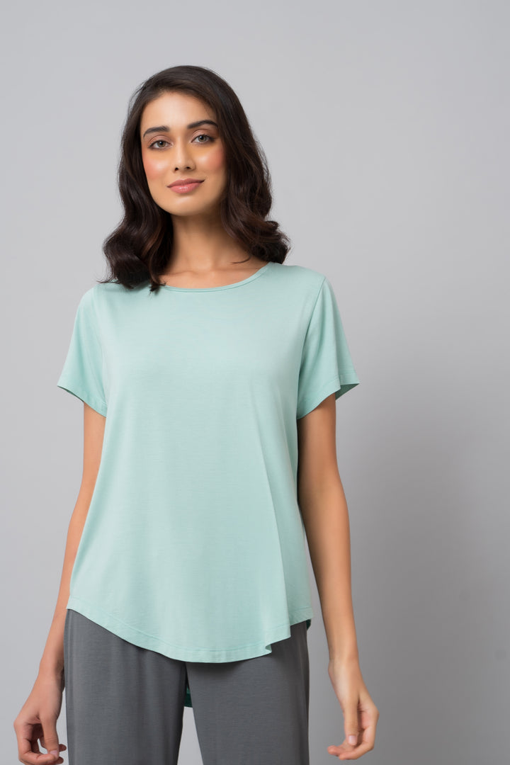 Delicate teal top for women, stylish and comfortable casual wear.