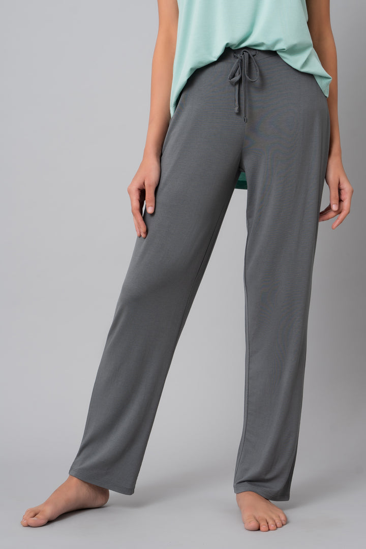 Grey Pearl Straight Lounge Pant modeled with a casual top and bare feet.