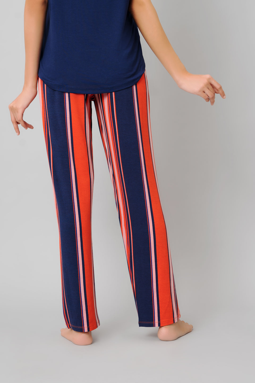 Classic Stripe Pajama Set featuring vibrant striped pants and a matching top.