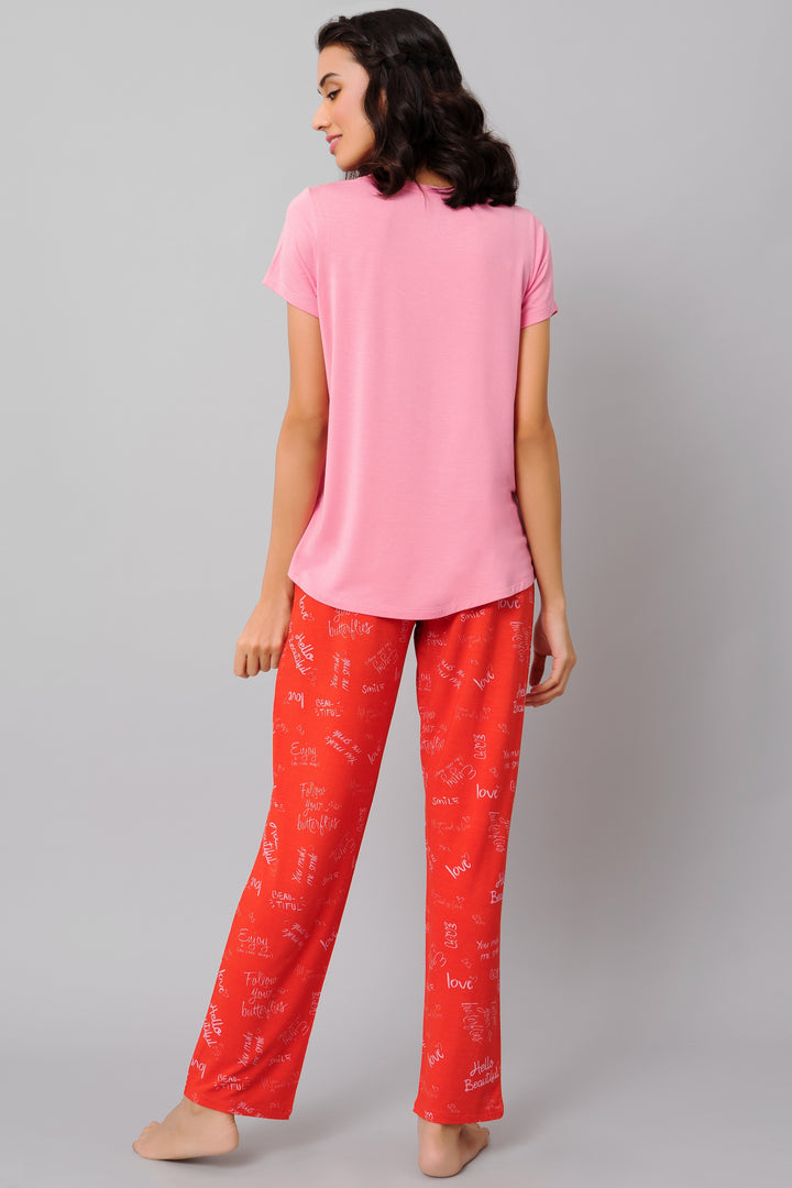 "Women's Follow Your Butterflies Pajama Set in pink and red print."