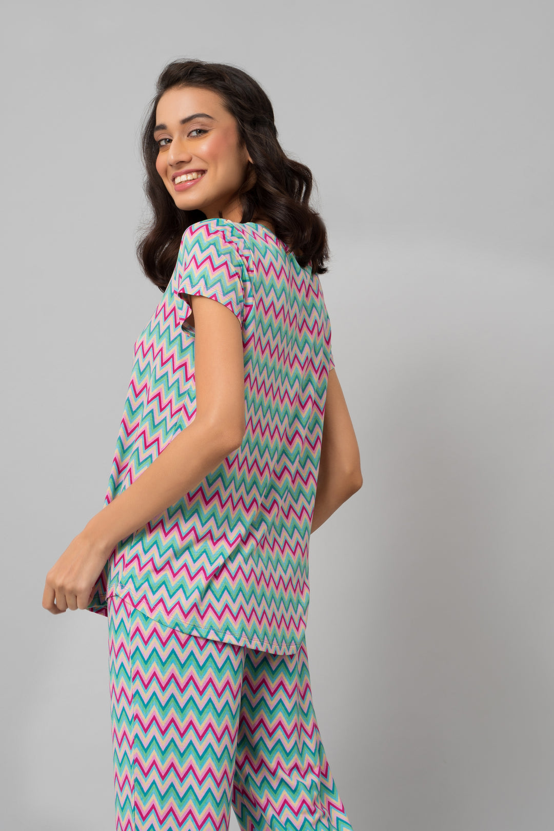 Candy Stripes Pajama Set on model, vibrant zigzag pattern, comfortable sleepwear.