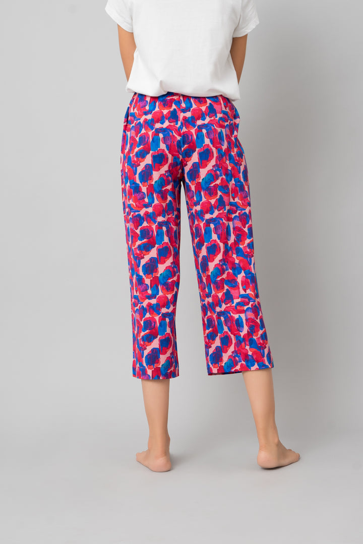 Artsy Watercolor Capri pants featuring colorful abstract patterns.