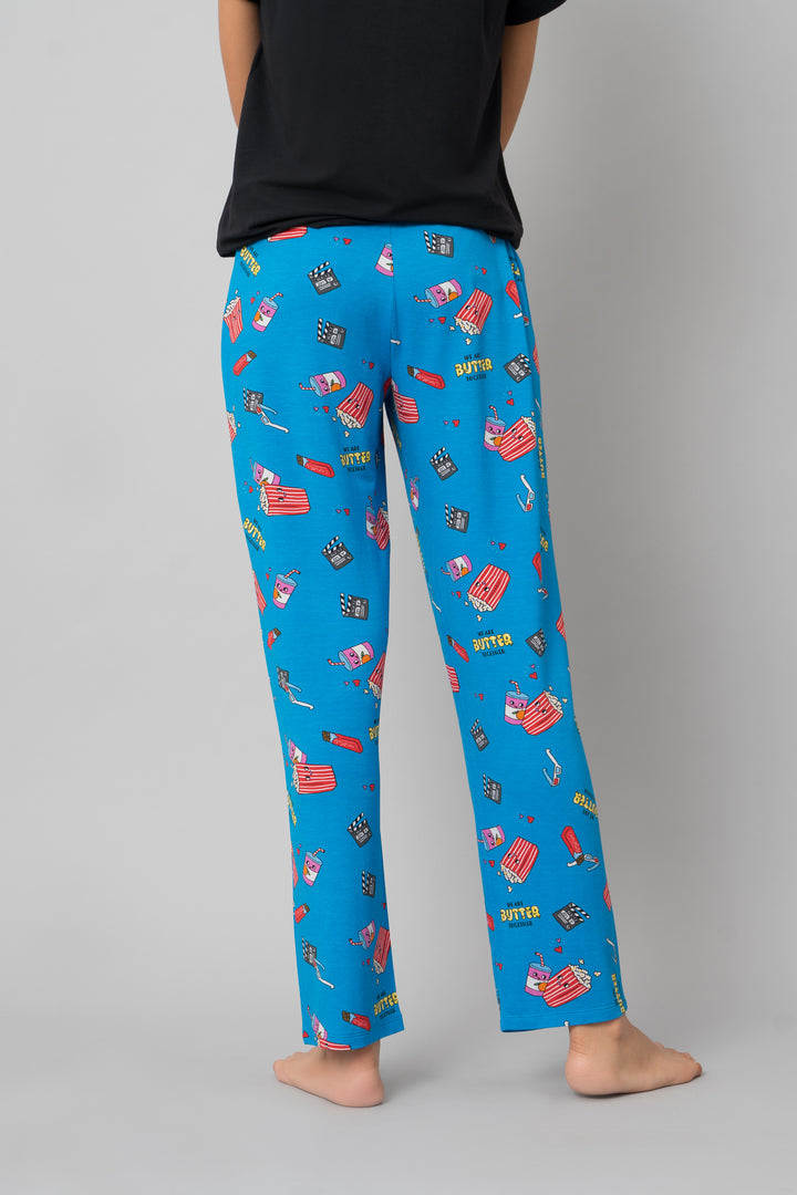 Colorful Butter Together Pajama Set with playful food and movie graphics.