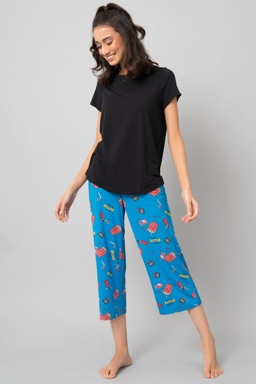 Everyday Black Capri Set featuring a black top and fun patterned pants.