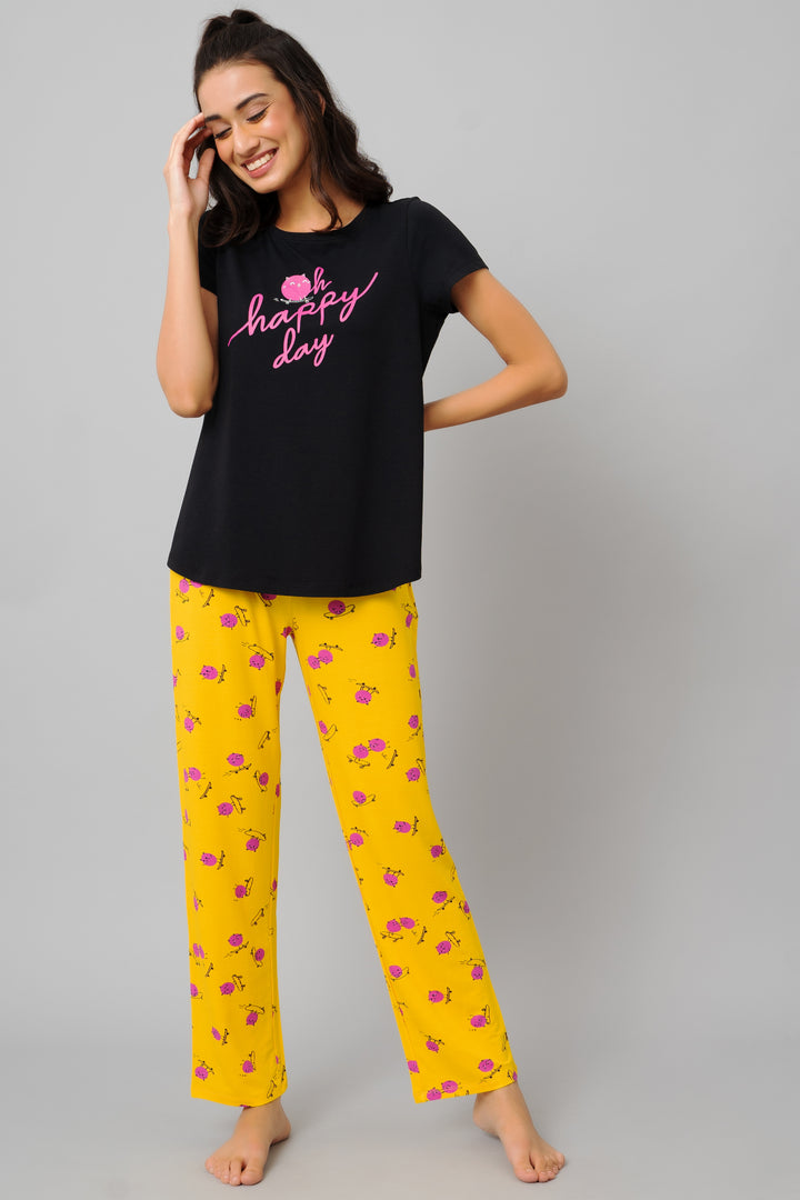 Fuffy Kitty Pajama Set featuring playful cat print and stylish tee.