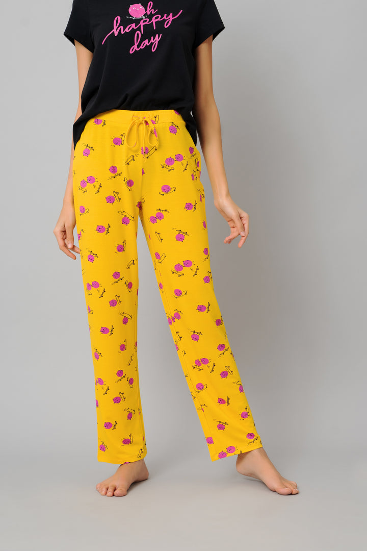 Fuffy Kitty Pajama Set with playful yellow pants and black top.