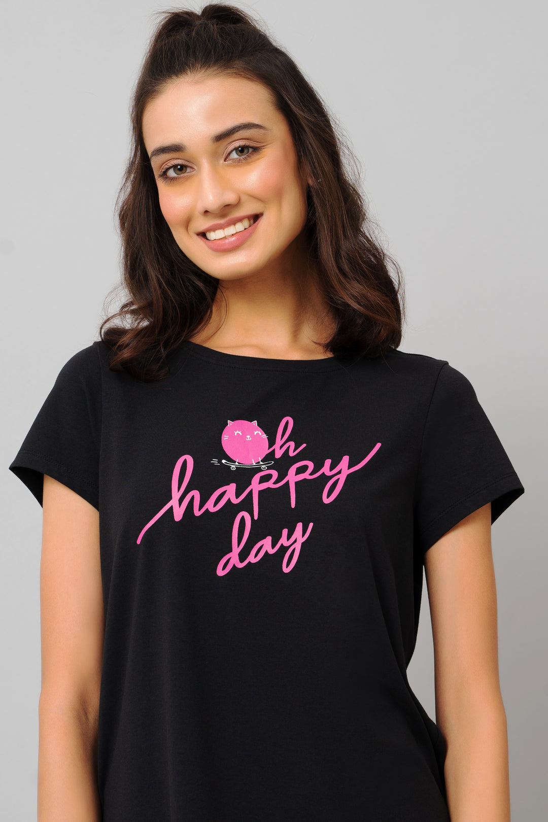 Oh Happy Day pajama set model smiling in black t-shirt.