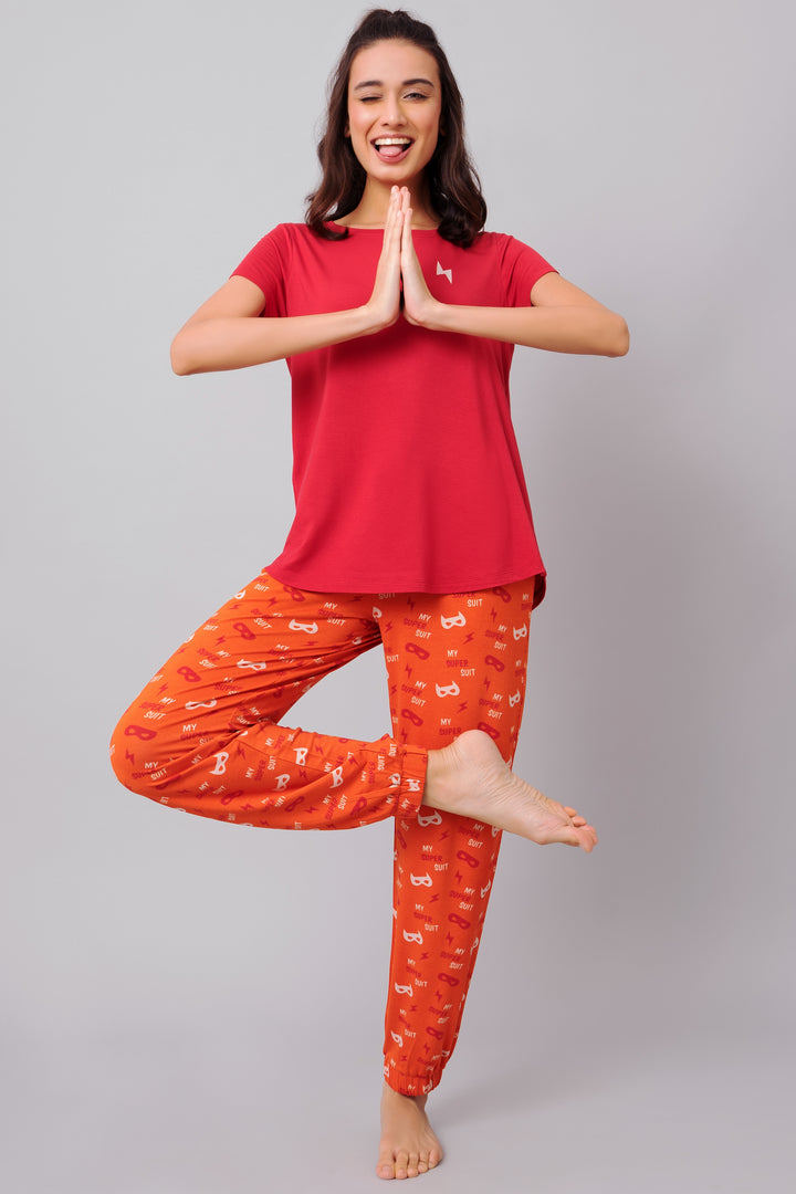 Frenzy Bolt Capri Set: stylish red top with playful orange patterned pants.