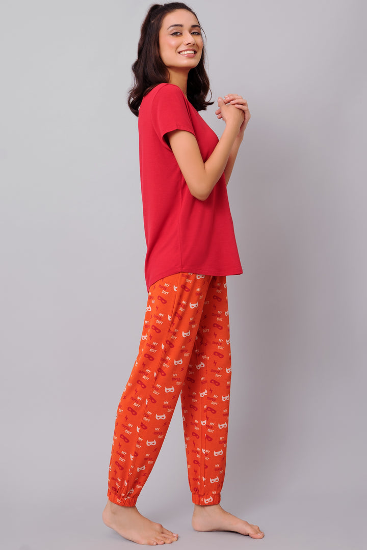 Frenzy Bolt Pajama Set featuring a red top and playful orange pants.