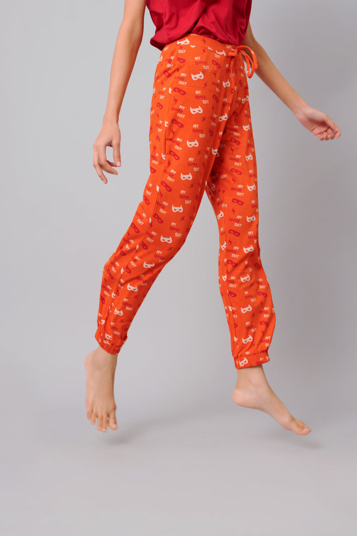 "Frenzy Bolt Pajama Set in orange with playful superhero designs."