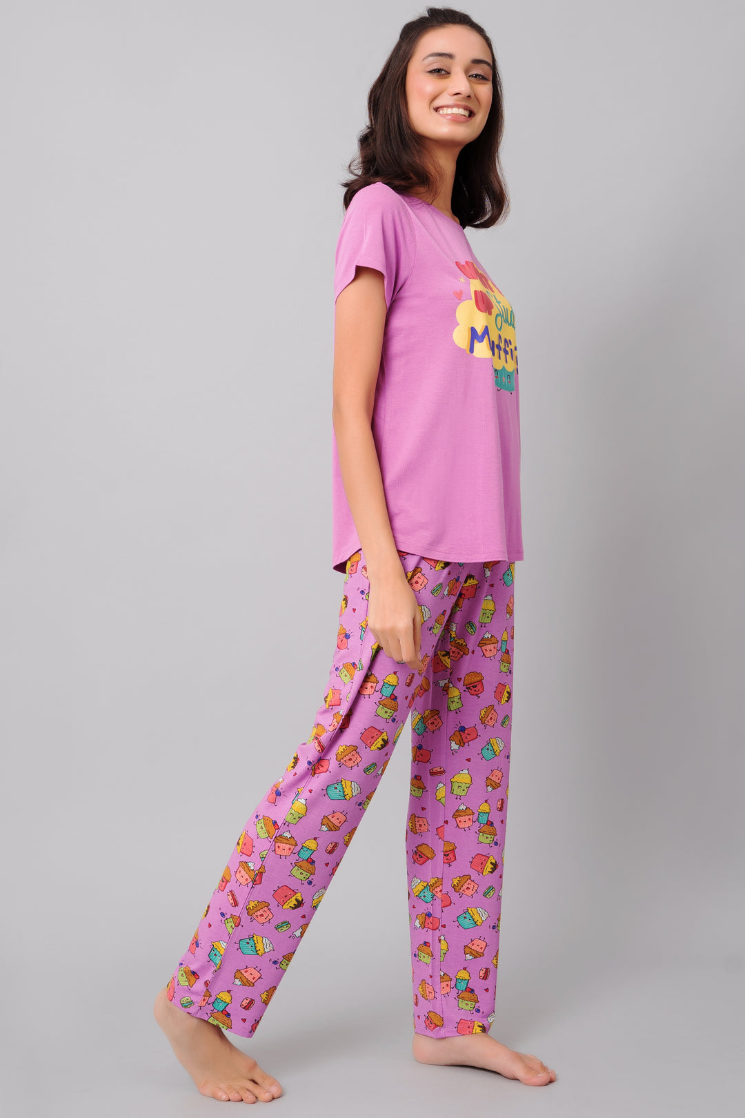 "Stylish Stud Muffin pajama set in pink with playful cupcake design."